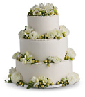 Freesia and Ranunculus Cake Decoration from Olney's Flowers of Rome in Rome, NY
